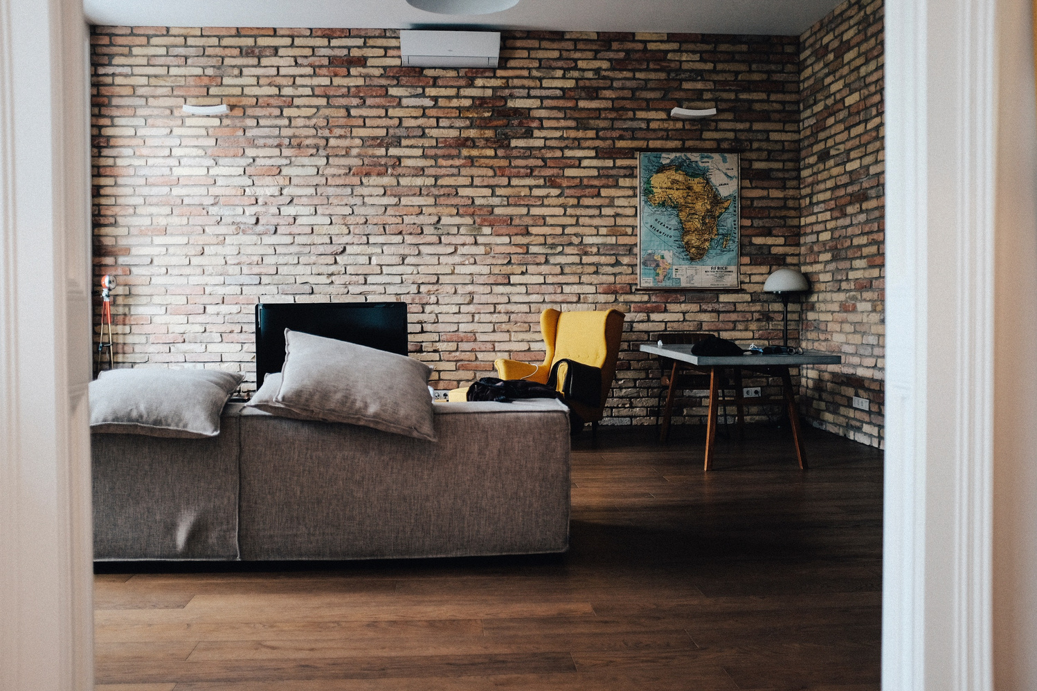 Modern Living Room Interior with Brick Wall